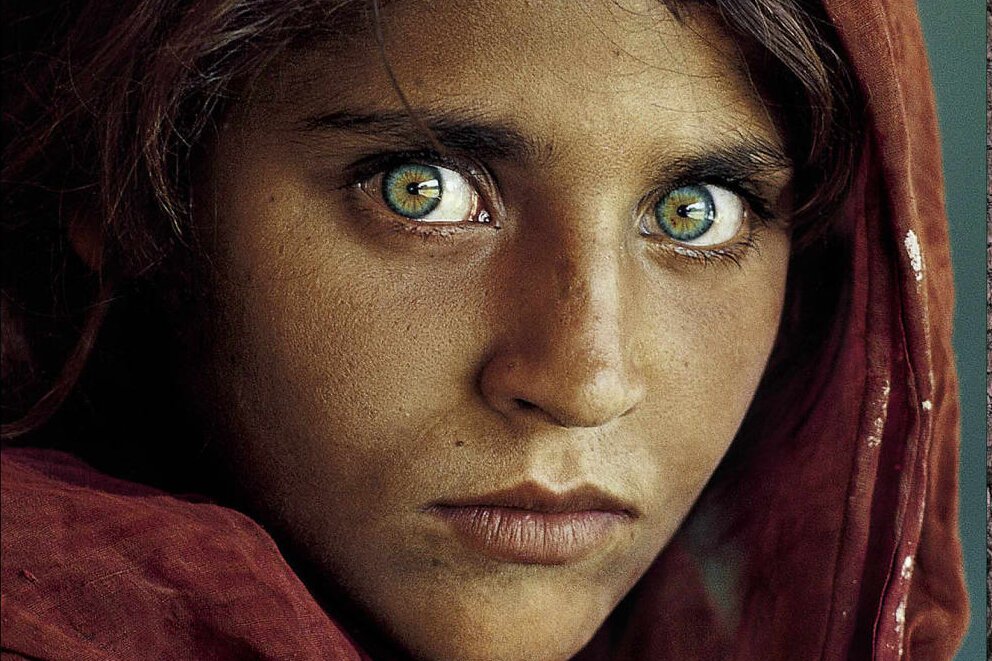 "The Afghan Girl" by Steve McCurry (1984)